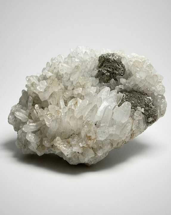 Druzy Cubic Pyrite on Opaque Quartz Cluster. Peru.