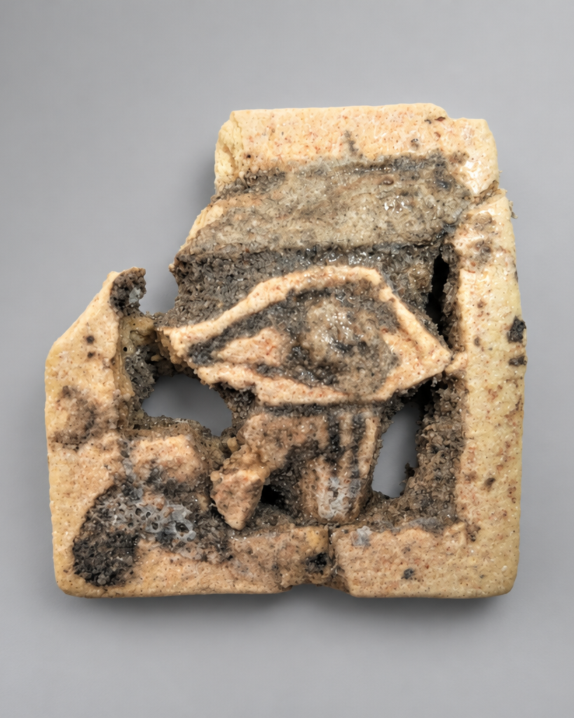 Ancient Egyptian Openwork Wedjat Eye (Eye of Horus) - Cream Faience with Black Manganese Pigment - Third Intermediate Period, c. 1069-664 BC