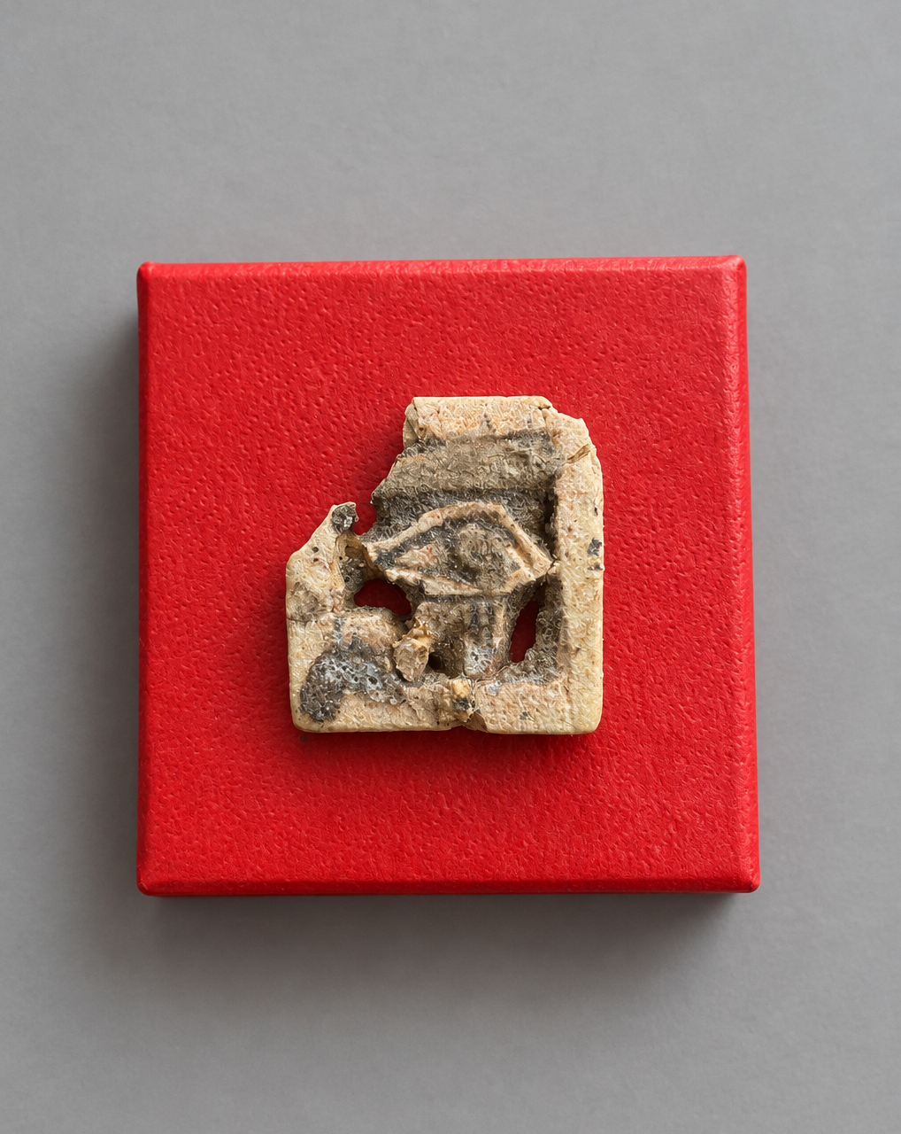 Ancient Egyptian Openwork Wedjat Eye (Eye of Horus) - Cream Faience with Black Manganese Pigment - Third Intermediate Period, c. 1069-664 BC