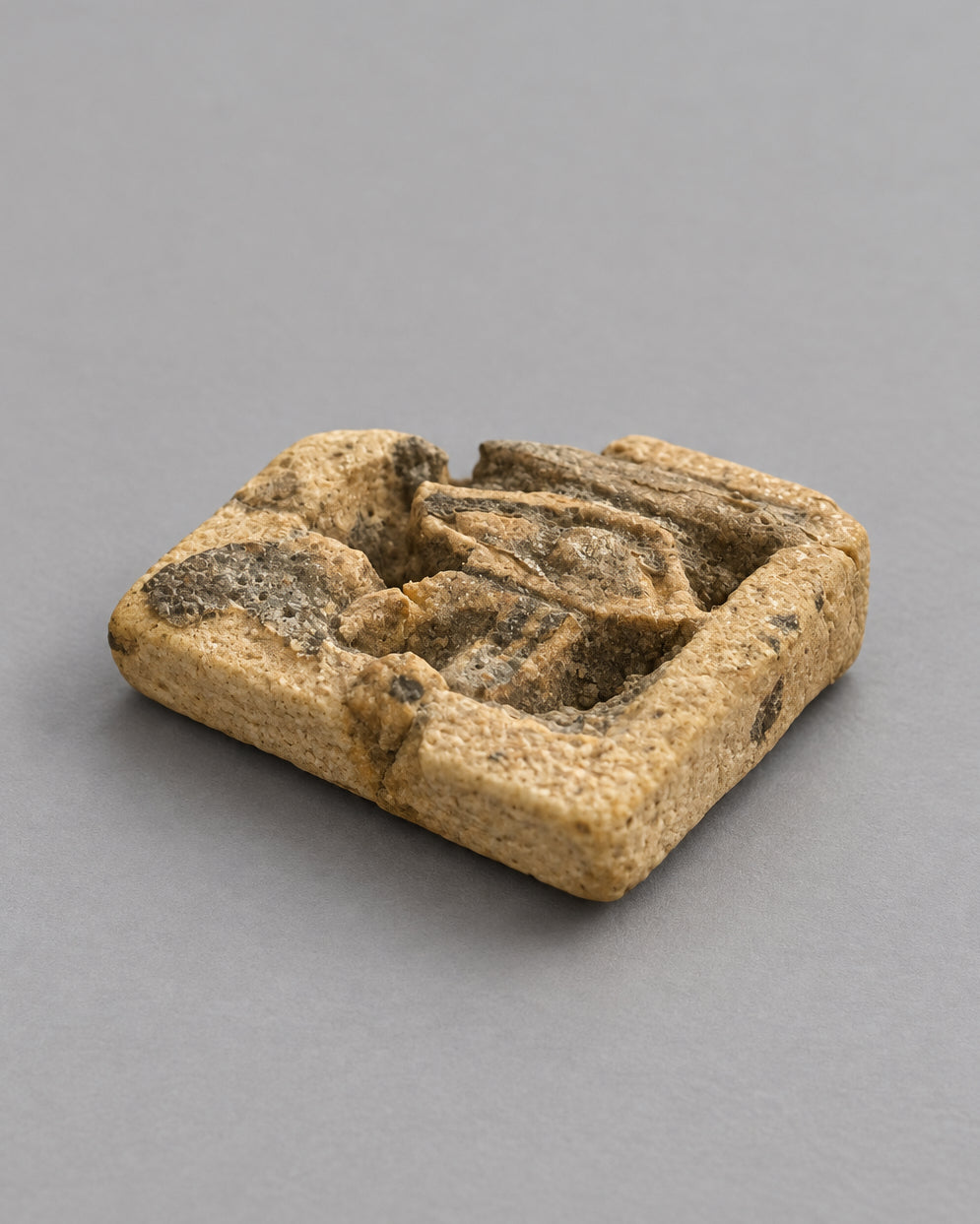 Ancient Egyptian Openwork Wedjat Eye (Eye of Horus) - Cream Faience with Black Manganese Pigment - Third Intermediate Period, c. 1069-664 BC