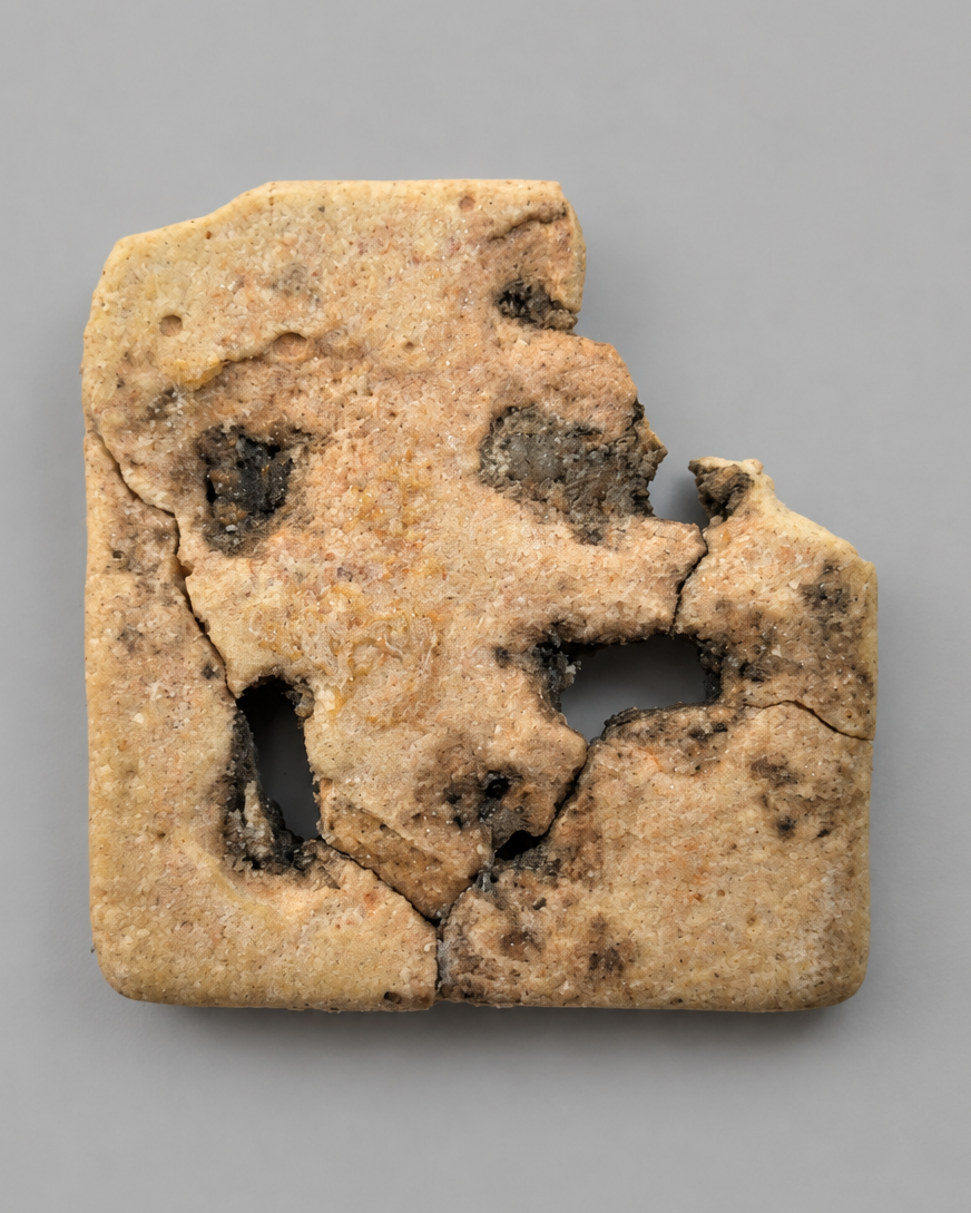 Ancient Egyptian Openwork Wedjat Eye (Eye of Horus) - Cream Faience with Black Manganese Pigment - Third Intermediate Period, c. 1069-664 BC