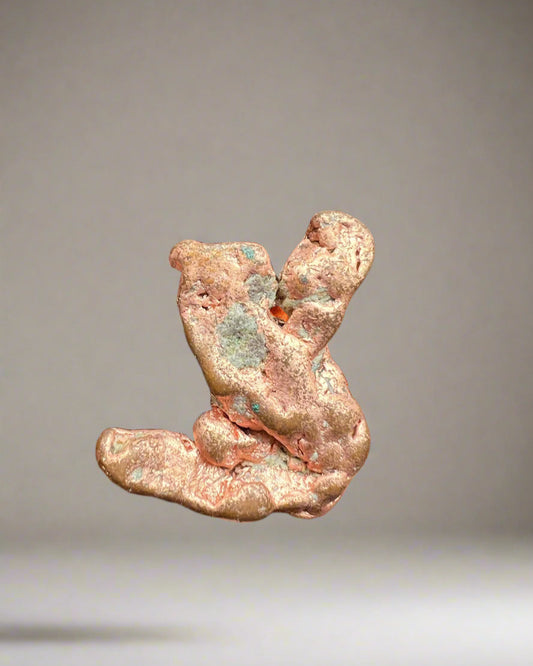 Native copper nugget- unusual shape and blue mineral inclusions