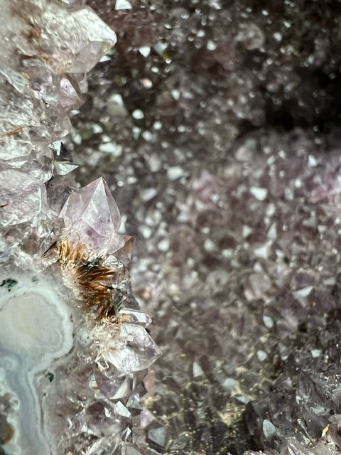 Large Brazilian amethyst cathedral geode with unique natural inclusions.