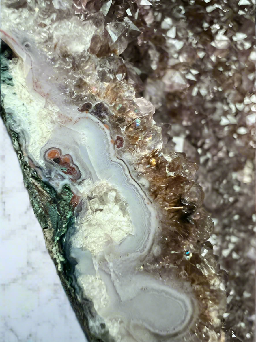 Large Brazilian amethyst cathedral geode with unique natural inclusions.