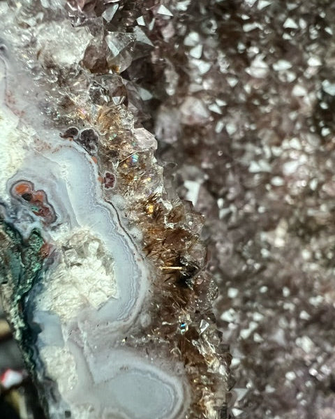 Large Brazilian amethyst cathedral geode with unique natural inclusions.