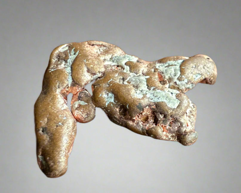 Native copper nugget- unusual shape and blue mineral inclusions