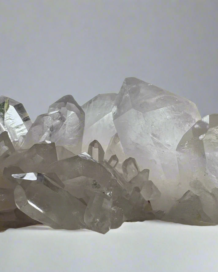 Clear quartz cluster formation with refractive inclusions. Brazil