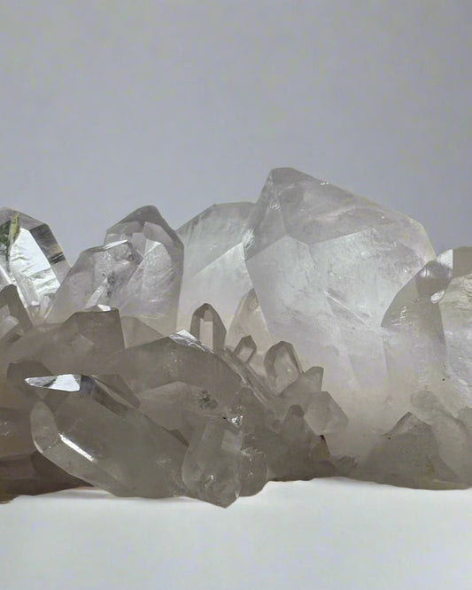 Clear quartz cluster formation with refractive inclusions. Brazil