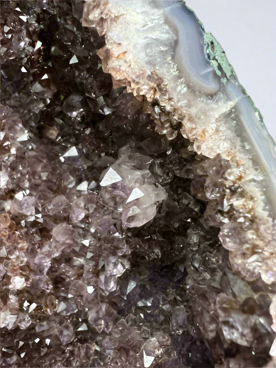 Large Brazilian amethyst cathedral geode with unique natural inclusions.