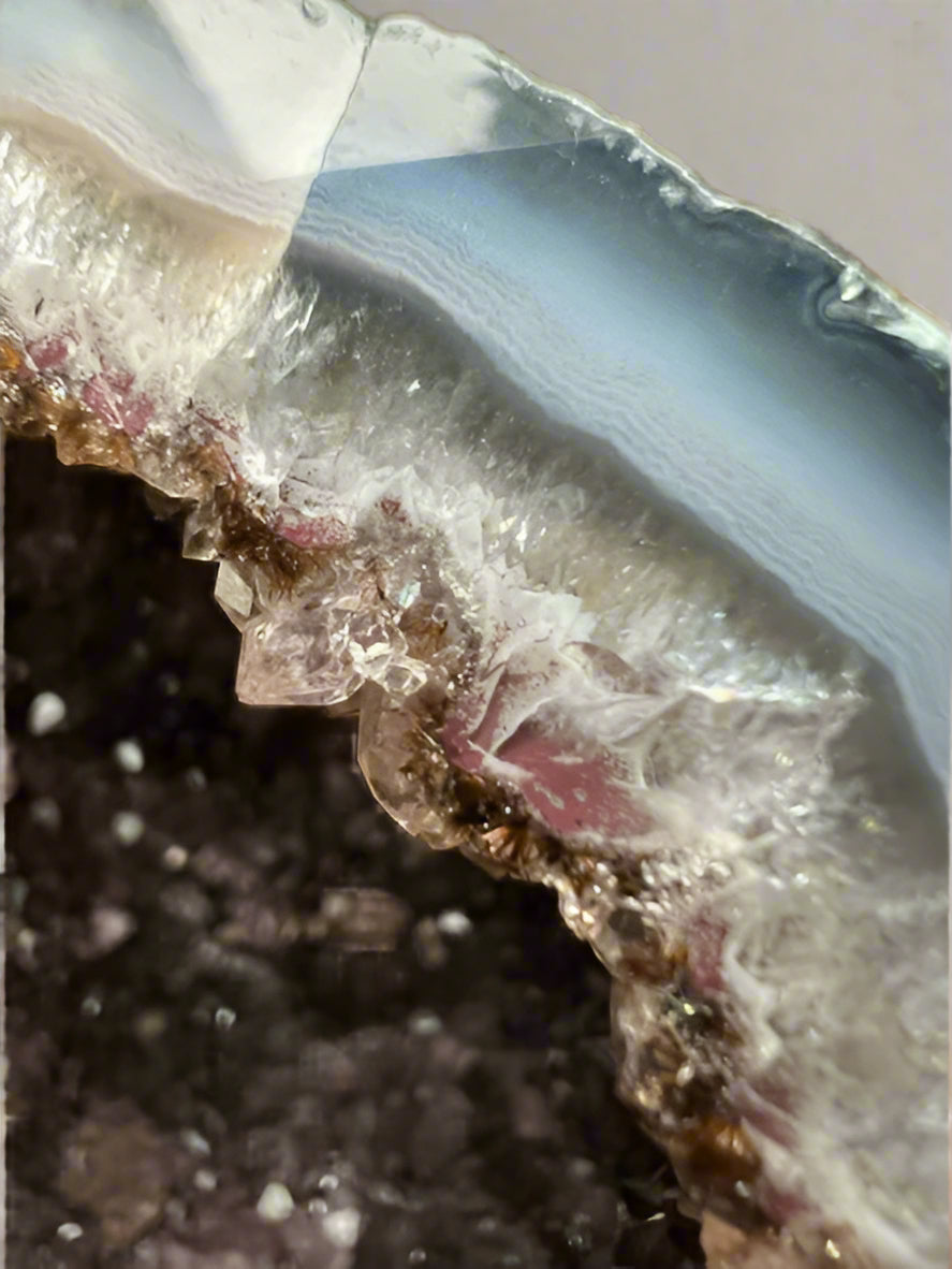 Large Brazilian amethyst cathedral geode with unique natural inclusions.